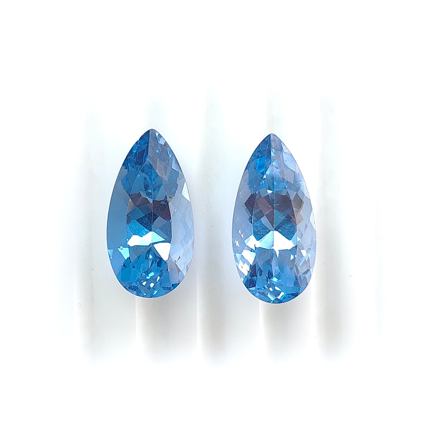 synthetic sapphire pear shape faceted cut