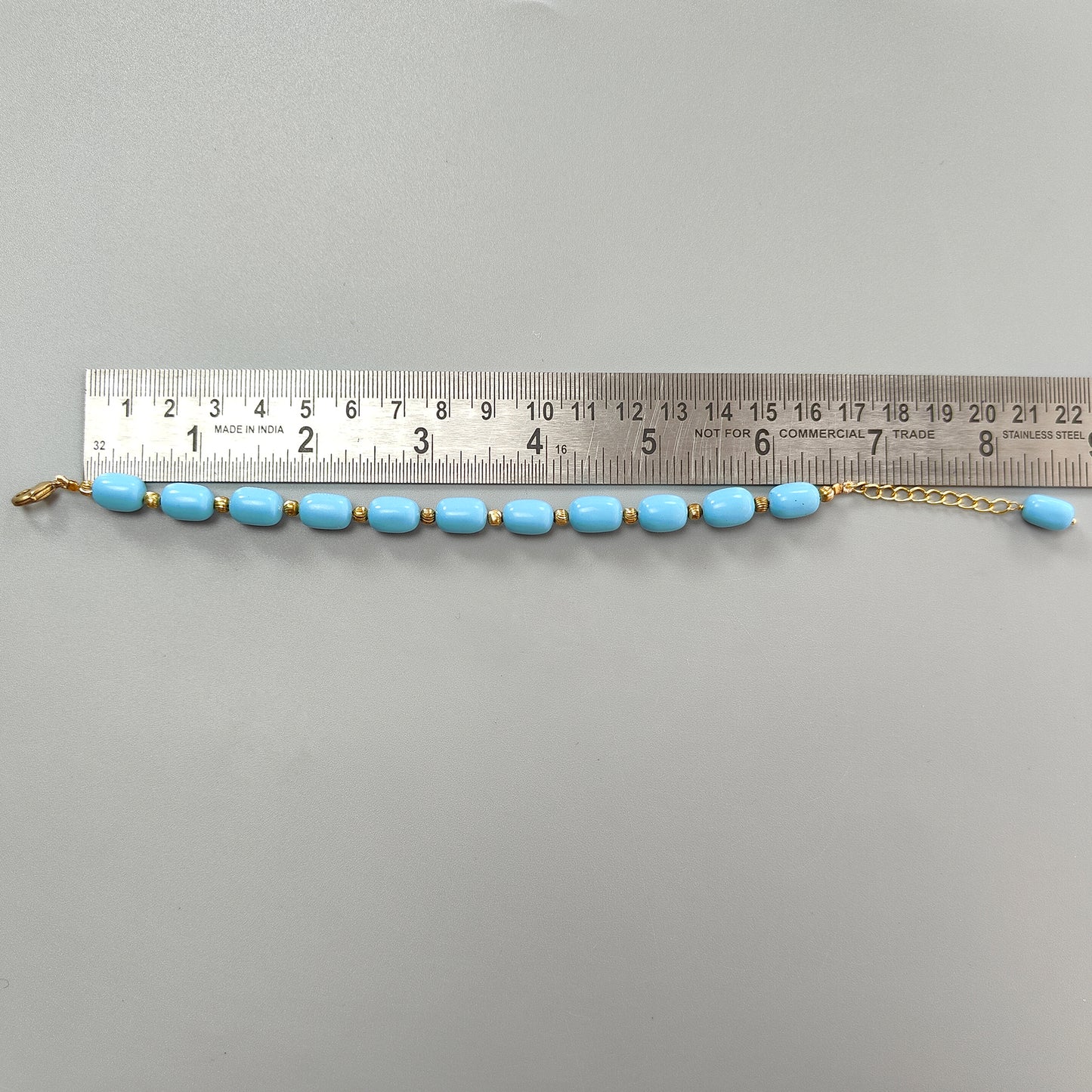 Blue Synthetic Turquoise Beads Bracelet: 63.75cts Simulant Turquoise Baguette Plain Brass Bracelet 10mm 7"
