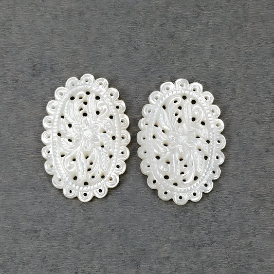mother of pearl oval carving