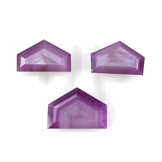 ruby uneven shape faceted cut