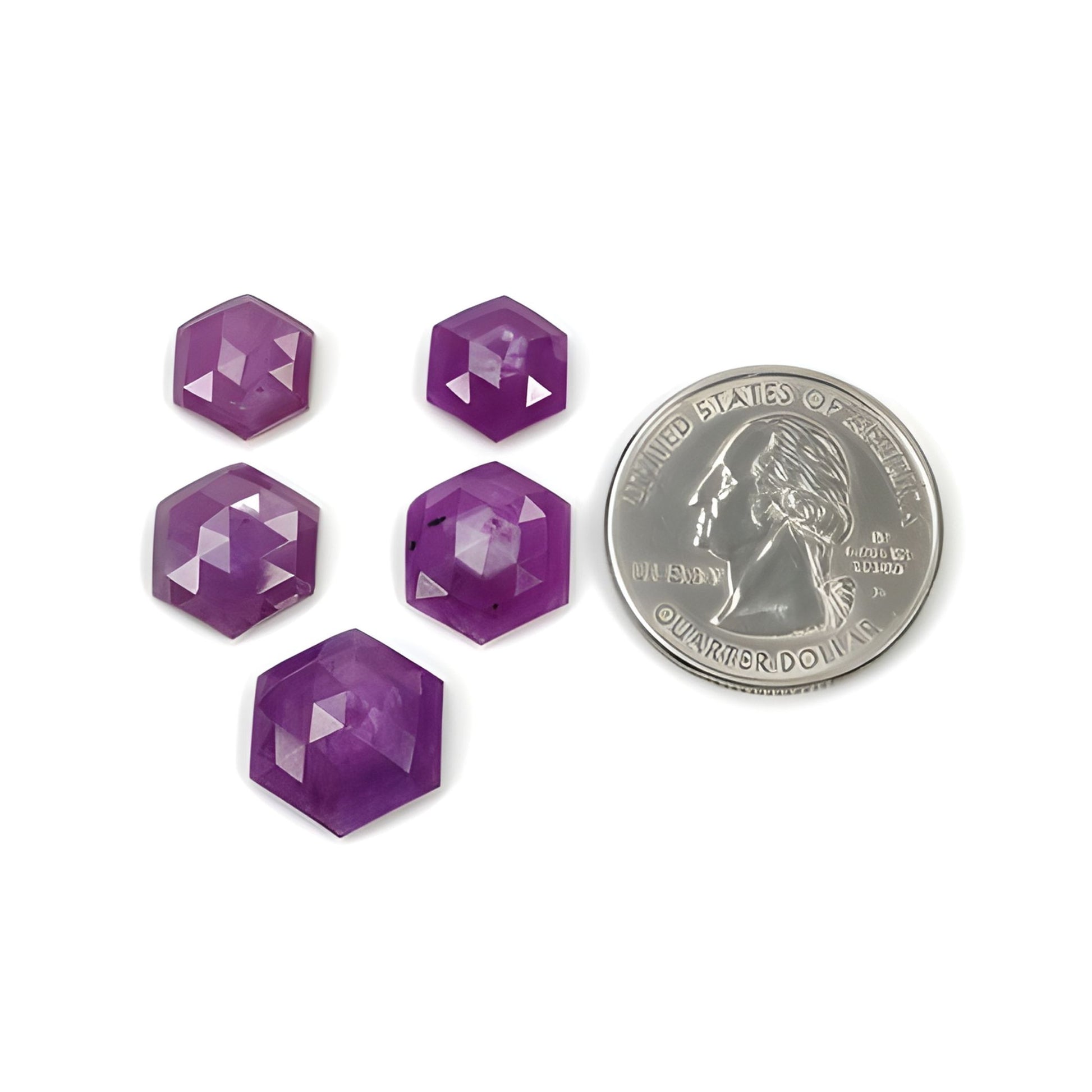 Five purple hexagonal gemstones